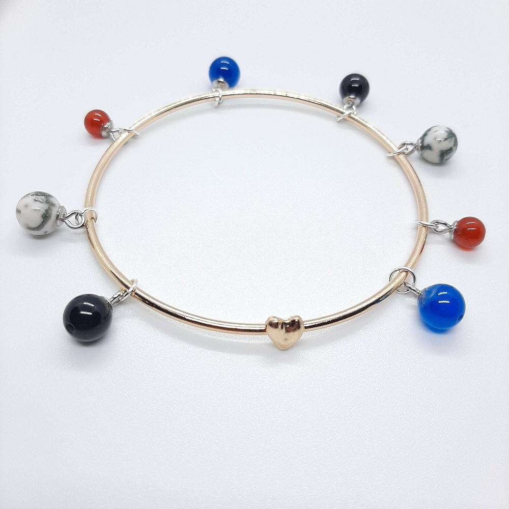 Bracciale rigido dorato cuore pietre