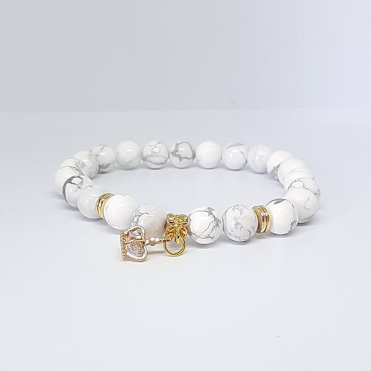 Bracciale con pietre bianche charm corona elastico