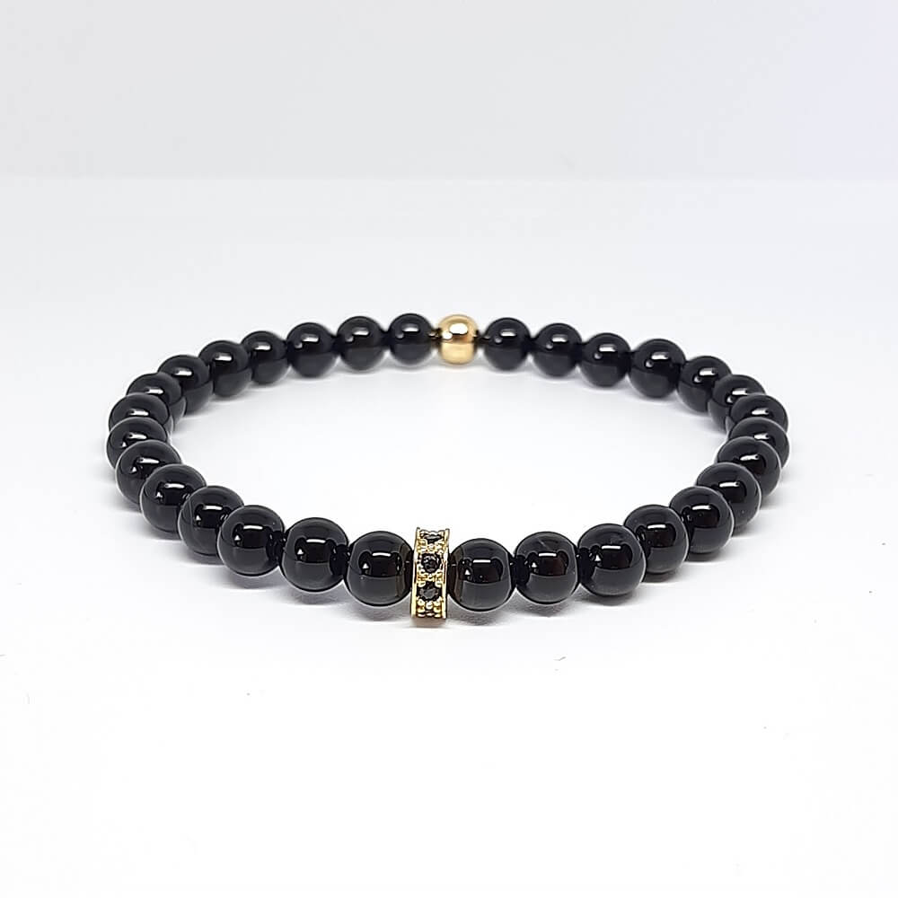 Bracciale pietra nera lucida charm rondella zirconata elastico