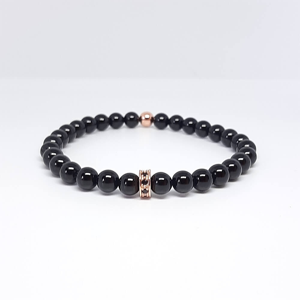 Bracciale pietra nera lucida charm rondella zirconata elastico