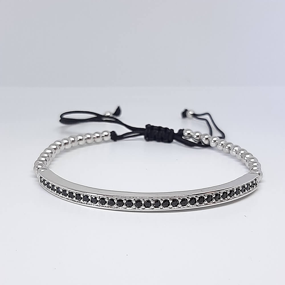 Bracciale con perle in metallo macramè charm targa zirconata