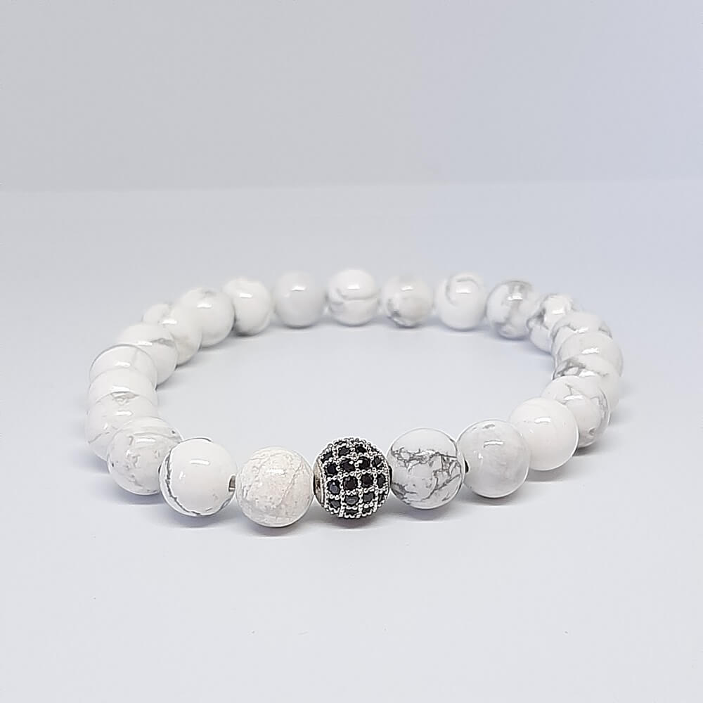 Bracciale con pietre bianche charm perla zirconata elastico