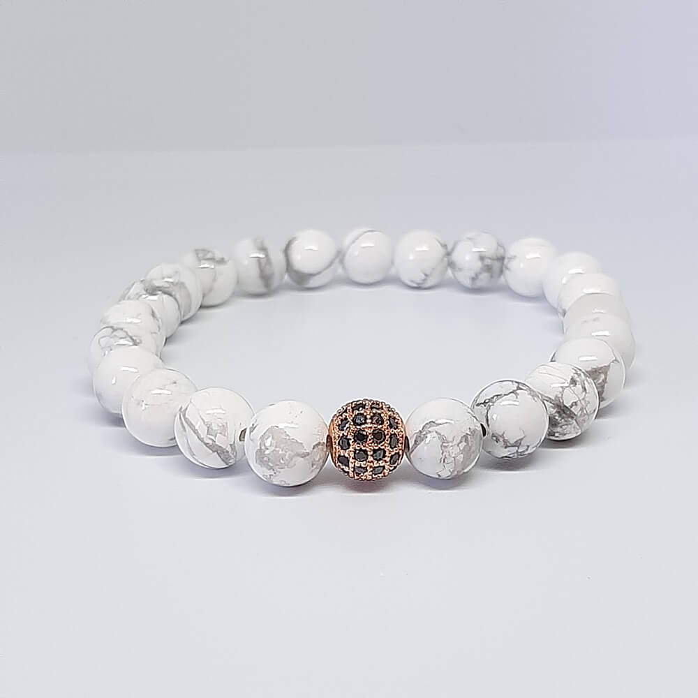 Bracciale con pietre bianche charm perla zirconata elastico