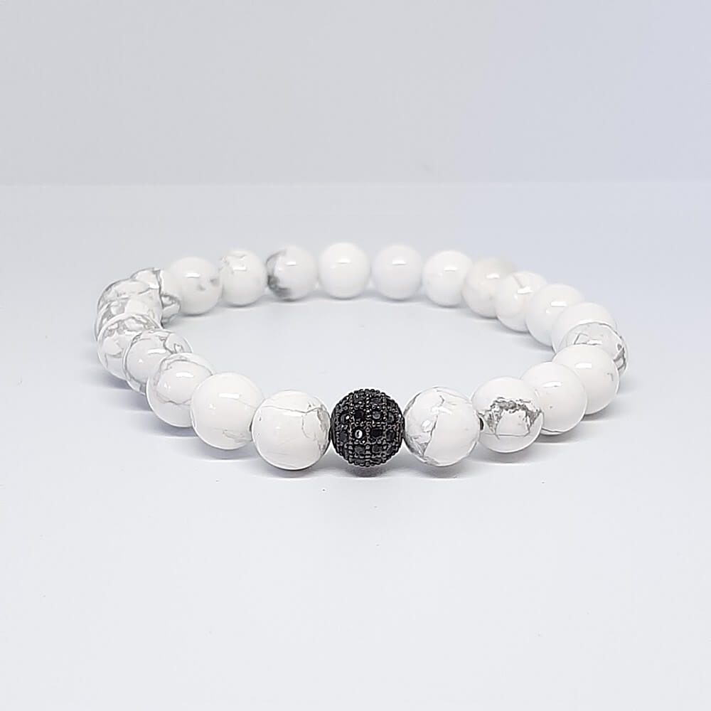 Bracciale con pietre bianche charm perla zirconata elastico