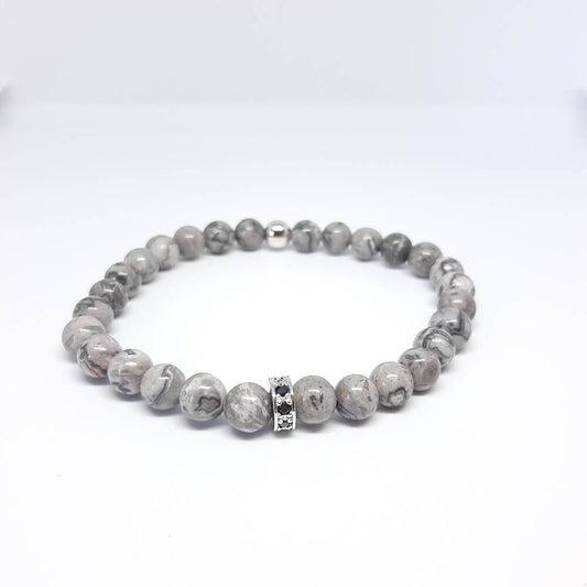 Bracciale con pietre grigio charm rondella zirconata elastico