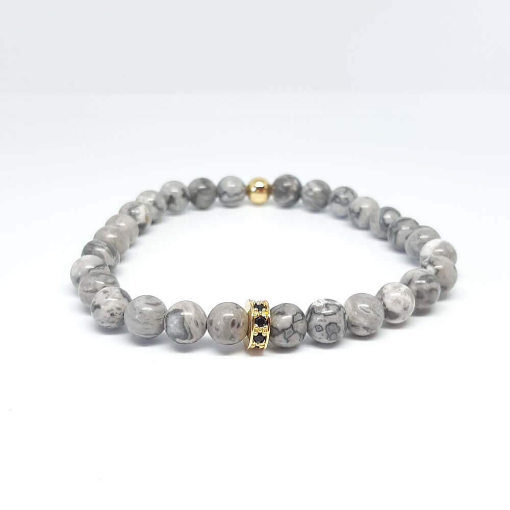 Bracciale con pietre grigio charm rondella zirconata elastico